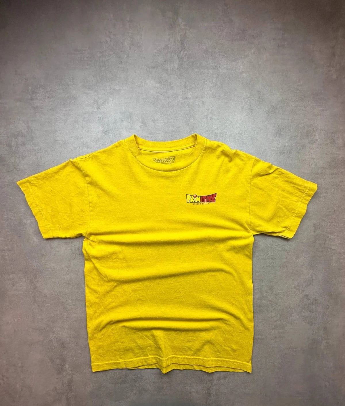 T-Shirt Dragon Ball Z Primitive Goku Graphic Jaune – Y2K