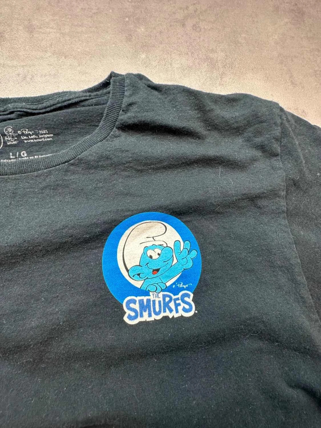 T-Shirt The Smurfs Officiel Peyo 2023 Noir – Grand Imprimé Dos